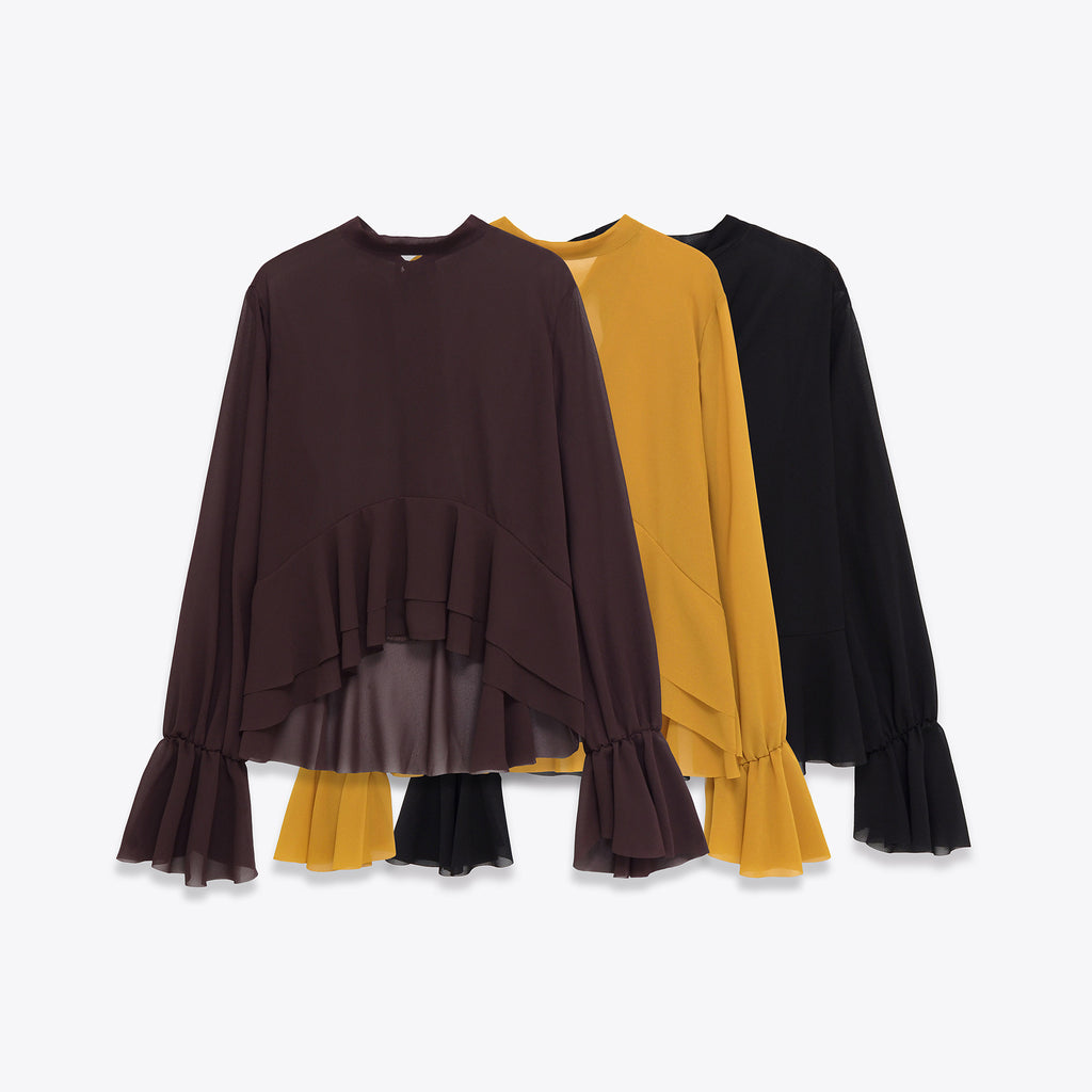 Elegant Chiffon Top With A Flowing Ruffled Hem